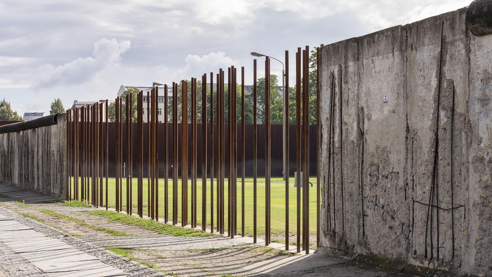 The Berlin Wall Memorial on Bernauer Strasse with remains of the Wall and iron bars